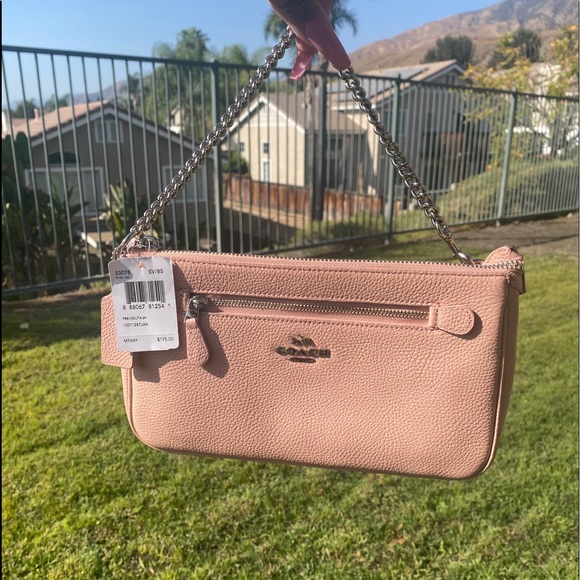 Coach Handbags - COACH Light pink purse , NWT
